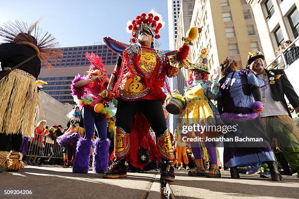 Member of the Mondo Kayo Social and Marching Club parades down St. Charles Avenue during Mardi Gras day on February 9, 2016 in New Orleans,...