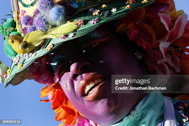 Member of the Mondo Kayo Social and Marching Club parades down St. Charles Avenue during Mardi Gras day on February 9, 2016 in New Orleans,...