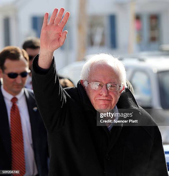 Democratic presidential candidate Bernie Sanders walks through downtown Concord on election day on February 9, 2016 in Concord, New Hampshire....