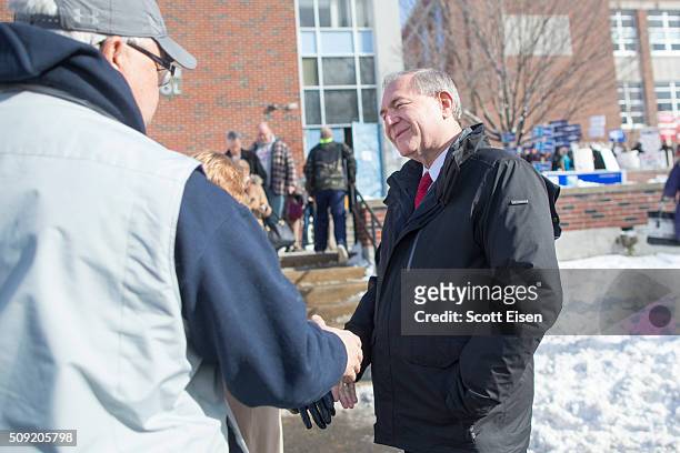 Republican presidential candidate Jim Gilmore greets voters outside the polling place at Webster School on primary day February 9, 2016 in...