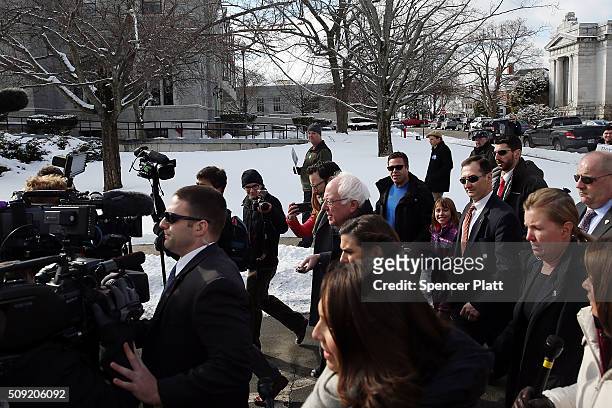 Democratic presidential candidate Senator Bernie Sanders walks through downtown Concord on election day on February 9, 2016 in Concord, New...