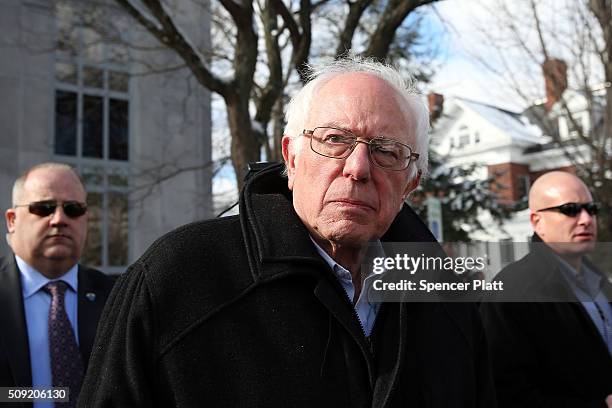 Democratic presidential candidate Senator Bernie Sanders walks through downtown Concord on election day on February 9, 2016 in Concord, New...