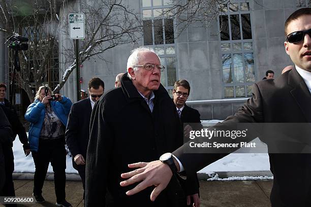 Democratic presidential candidate Senator Bernie Sanders walks through downtown Concord on election day on February 9, 2016 in Concord, New...