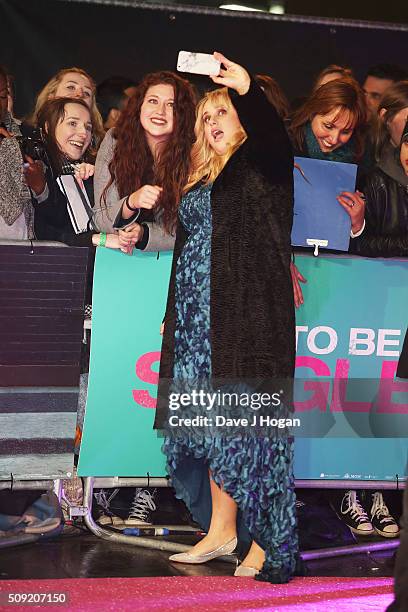 Rebel Wilson poses with fans during the UK Premiere of "How To Be Single" at Vue West End on February 9, 2016 in London, England.