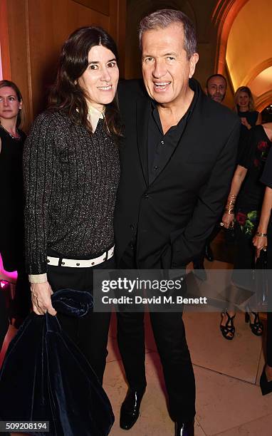 Bella Freud and Mario Testino attend a private view of "Vogue 100: A Century of Style" hosted by Alexandra Shulman and Leon Max at the National...