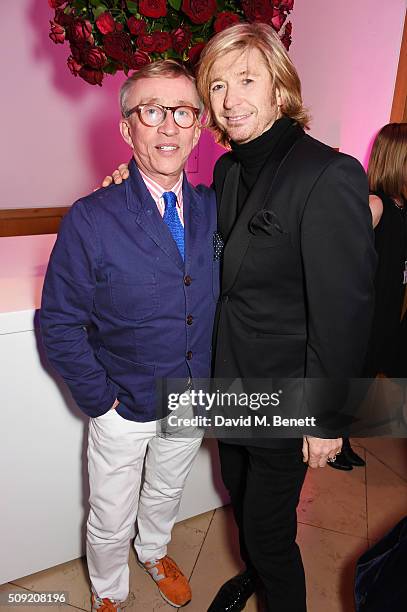 Jasper Conran and Nicky Clarke attend a private view of "Vogue 100: A Century of Style" hosted by Alexandra Shulman and Leon Max at the National...