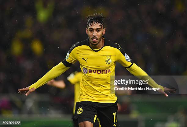 Pierre-Emerick Aubameyang of Borussia Dortmund celebrates as he scores their second goal during the DFB Cup Quarter Final match between VfB Stuttgart...