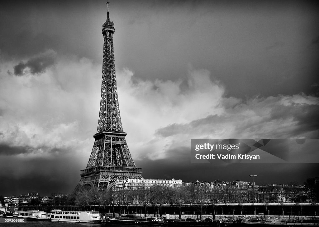 Eiffel Tower in dramatic sky, black & white