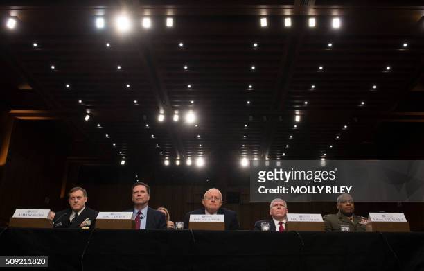 National Security Agency Director Adm. Michael Rogers, FBI Director James Comey, Director of National Intelligence James Clapper, CIA Director John...