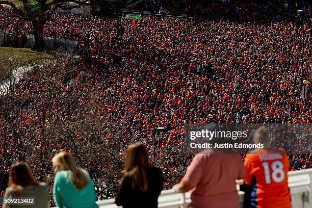 Fans of the Denver Broncos fill Civic Center Park as more watch from a balcony during a victory rally to celebrate their Super Bowl championship on...