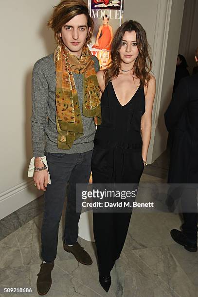 Max Hurd and Eleanor Calder attend a private view of "Vogue 100: A Century of Style" hosted by Alexandra Shulman and Leon Max at the National...