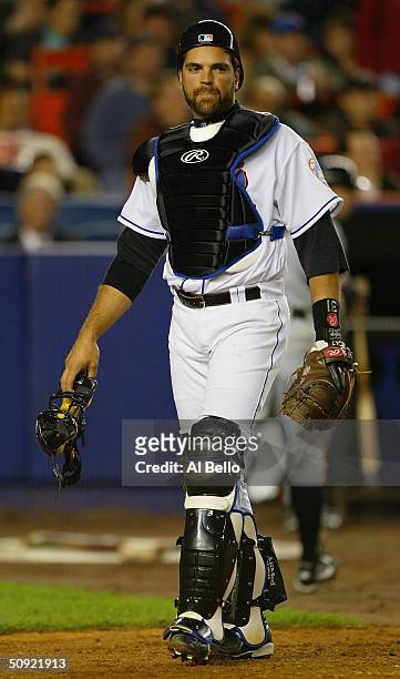 Catcher Mike Piazza of the New York Mets walks during the game against the San Francisco Giants at Shea Stadium on May 4, 2004 in Flushing, New York....