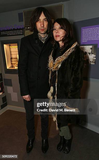 Bobby Gillespie and Katy England attend a private view of "Hendrix At Home" at Jimi Hendrix's restored former Mayfair flat on February 9, 2016 in...