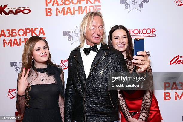 Polina Butorina, Matthias Hues and Natalya Gubina attend 'Showdown in Manila' premiere in October cinema hall on February 9, 2016 in Moscow, Russia.