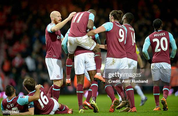 Angelo Ogbonna of West Ham United celebrates scoring the winning goal during the Emirates FA Cup Fourth Round Replay between West Ham United and...