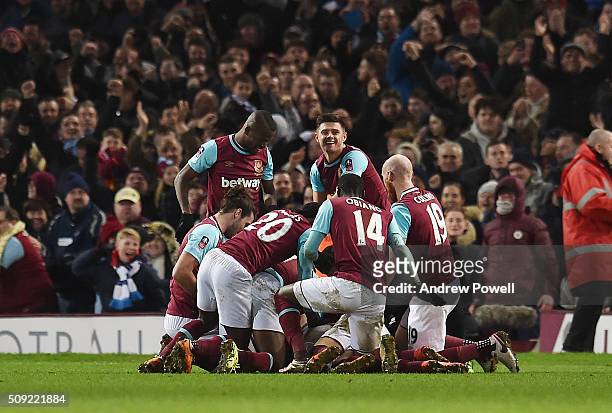 West Ham United celebrate after Angelo Ogbonna Obinze of West Ham United scores the winning goal during The Emirates FA Cup Fourth Round Replay match...