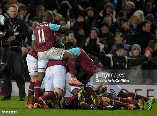 Angelo Ogbonna of West Ham United scores the winning goal the winning goal during the Emirates FA Cup Fourth Round Replay between West Ham United and...