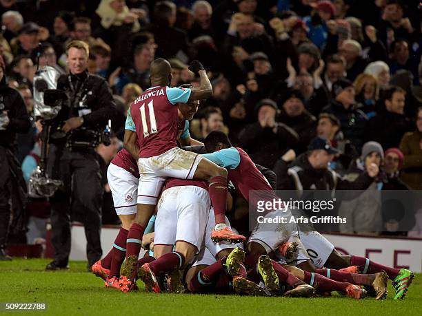 Angelo Ogbonna of West Ham United scores the winning goal the winning goal during the Emirates FA Cup Fourth Round Replay between West Ham United and...