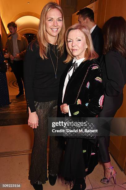 Tori Cook and Adi Cook attend a private view of "Vogue 100: A Century of Style" hosted by Alexandra Shulman and Leon Max at the National Portrait...