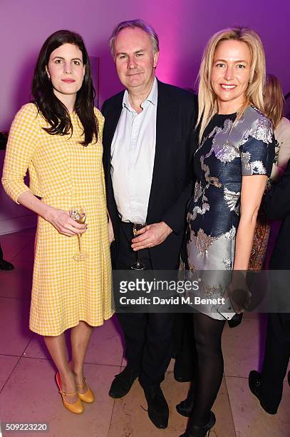 Laura Cathcart, William Cash and guest attend a private view of "Vogue 100: A Century of Style" hosted by Alexandra Shulman and Leon Max at the...