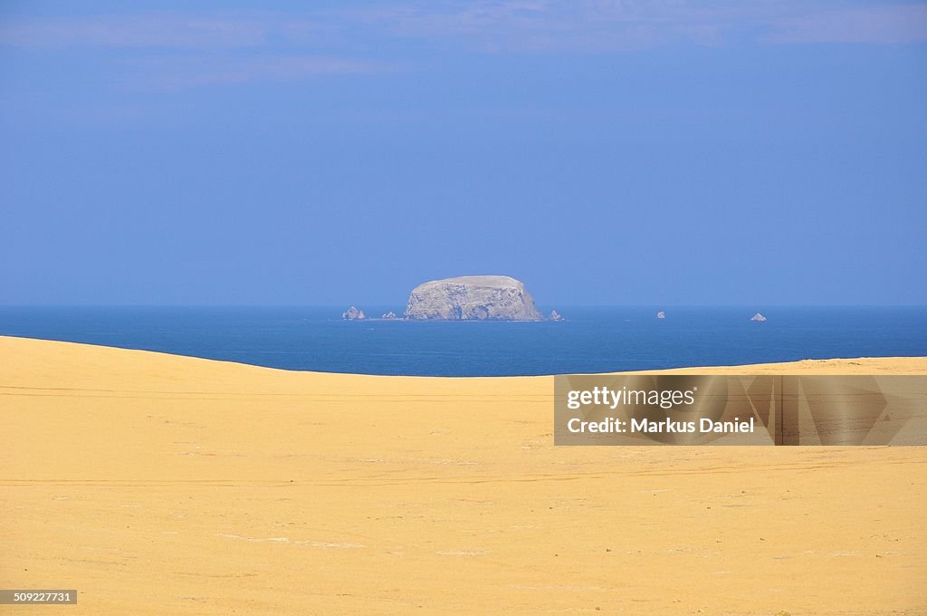 Small Nameless rock island in Paracas, Peru