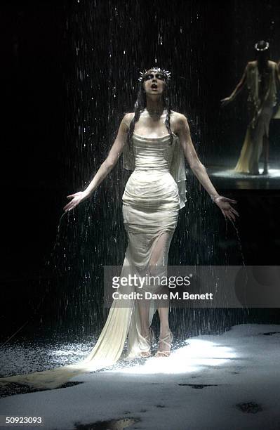 Model poses at the fashion show hosted by Alexander McQueen to mark fifth anniversary of the black American Express Centurion card at Earls Court 2...