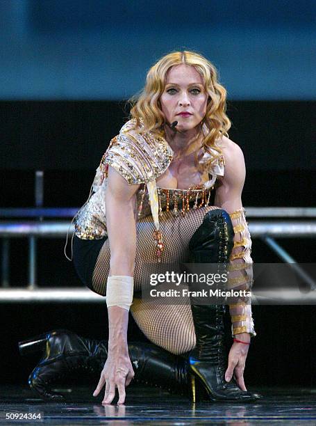 Singer/actress Madonna performs onstage during her "Re-Invention" World Tour 2004 at the Arrowhead Pond, June 3, 2004 in Anaheim, California. The...