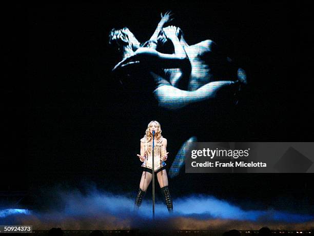 Singer/actress Madonna performs onstage during her "Re-Invention" World Tour 2004 at the Arrowhead Pond, June 3, 2004 in Anaheim, California. The...