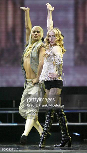 Singer/actress Madonna performs onstage during her "Re-Invention" World Tour 2004 at the Arrowhead Pond, June 3, 2004 in Anaheim, California. The...