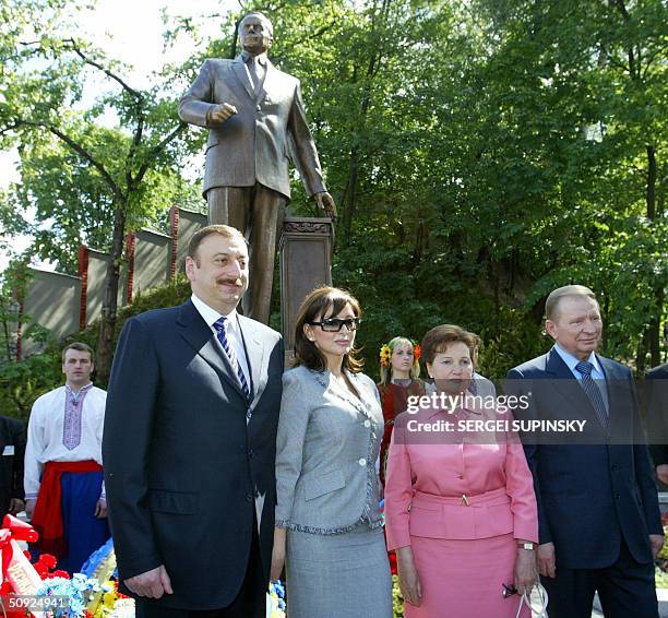 From the left to the right: Azeri President Ilham Aliyev, his wife Zafira Aliyev, Lyudmila Kuchma and Leonid Kuchma pose in front of monument of the...