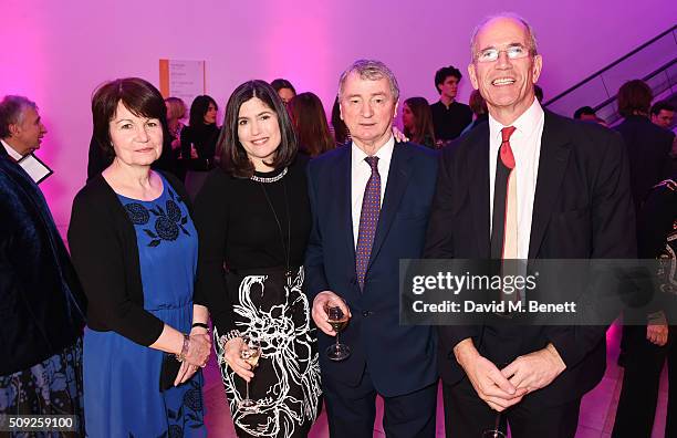 Guest, Kimberly Quinn, Stephen Quinn and Sandy Nairne attend a private view of "Vogue 100: A Century of Style" hosted by Alexandra Shulman and Leon...