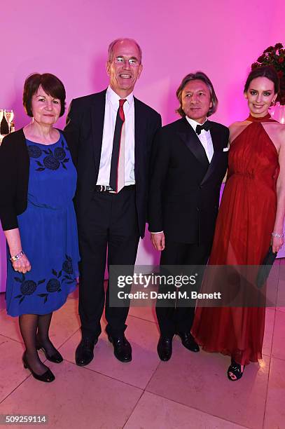 Sandy Nairne, Leon Max and Yana Max attend a private view of "Vogue 100: A Century of Style" hosted by Alexandra Shulman and Leon Max at the National...