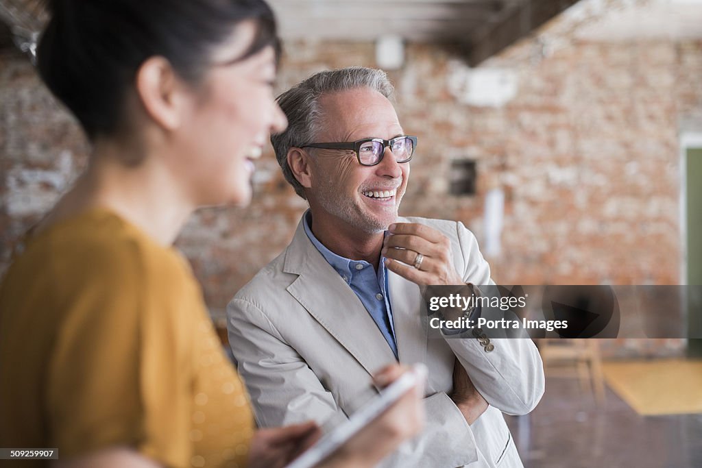 Happy business people in creative office