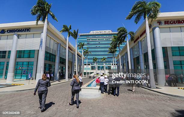 Workers of the Centro Pellas building evacuate it after a 4.1 degree quake in the Richter scale quake in Managua on February 9, 2016. There were no...