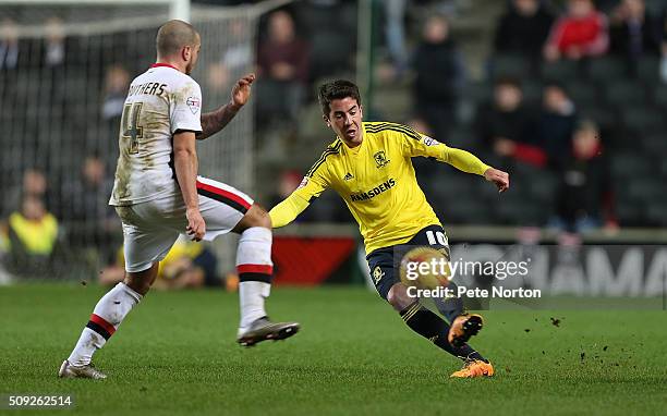 Carlos De Pena of Middlesbrough plays the ball past Samir Carruthers of Milton Keynes Dons during the Sky Bet Championship match between Milton...