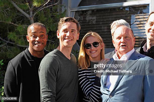 Actors Rocky Carroll, Brian Dietzen, Emily Wickersham and Mark Harmon and executive producer Mark Schilz attend the cake cutting celebration for...