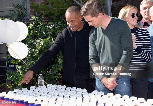 Actors Rocky Carroll, and Brian Dietzen attend the cake cutting celebration for "NCIS" 300th episode on February 9, 2016 in Valencia, California.