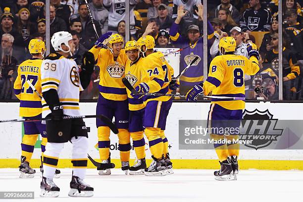 Marian Gaborik of the Los Angeles Kings celebrates with Alec Martinez, Vincent Lecavalier, Dwight King and Drew Doughty after scoring against the...