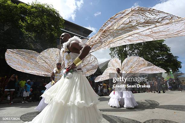 Members of the band 'Searching for Shangri-La' presented by K2K Alliance & Partners perform during the Parade of Bands as part of Trinidad and Tobago...