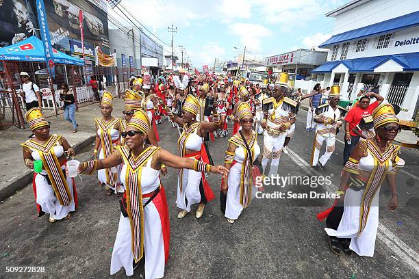 Members of the band 'A Touch of Woodbrook, Then and Now' presented by Trini Revellers, perform during the Parade of Bands as part of Trinidad and...