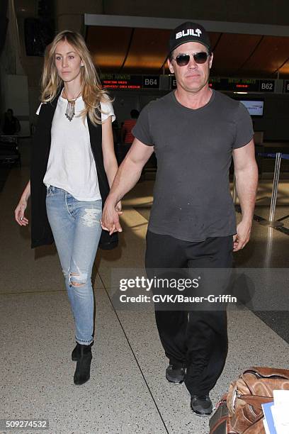 Josh Brolin and Kathryn Boyd are seen at LAX on February 09, 2016 in Los Angeles, California.