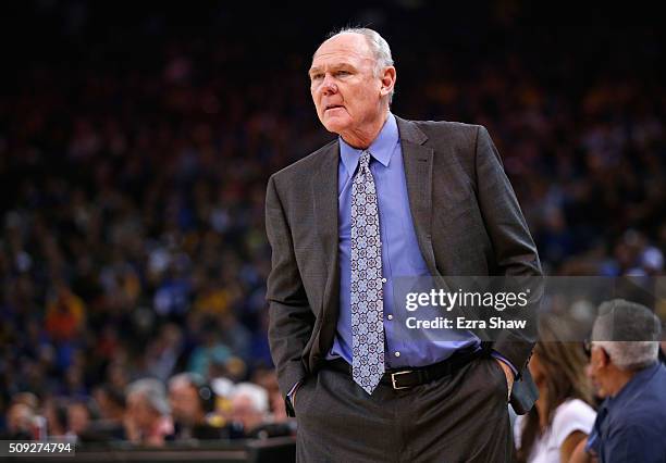 Head coach George Karl of the Sacramento Kings stands on the side of the court during their game against the Golden State Warriors at ORACLE Arena on...