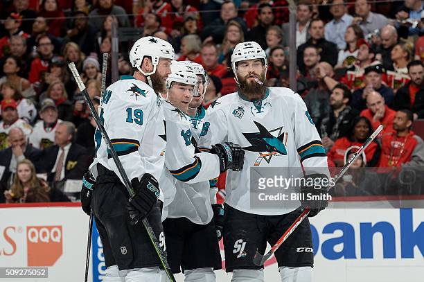 Patrick Marleau of the San Jose Sharks celebrates with teammates after scoring against the Chicago Blackhawks in the second period of the NHL game at...