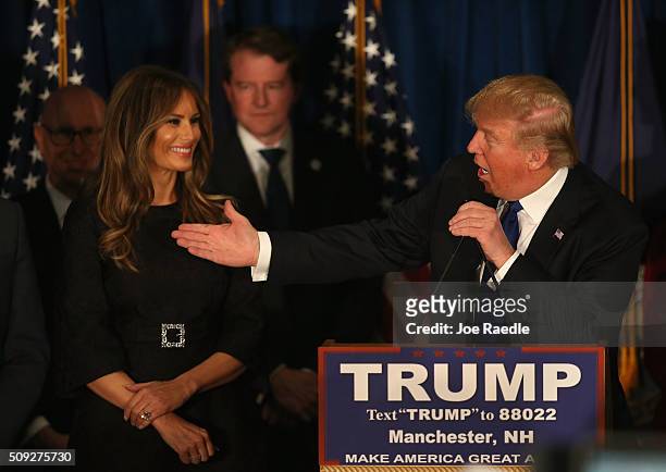Republican presidential candidate Donald Trump speaks as his wife Melania Trump looks on after Primary day at his election night watch party at the...