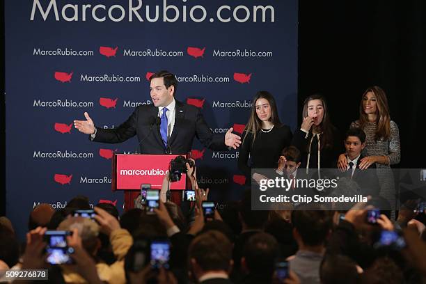 Republican presidential candidate Sen. Marco Rubio , his wife Jeanett Rubio and their children take the stage during a primary election night party...