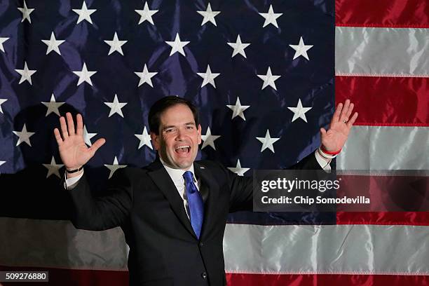 Republican presidential candidate Sen. Marco Rubio walks out on stage during a primary election night party at the Radisson hotel February 9, 2016 in...