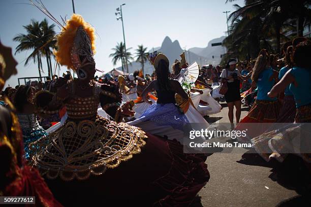 Revellers dance during Carnival celebrations at the Rio Maracatu 'bloco', or street parade, on February 9, 2016 in Rio de Janeiro, Brazil....