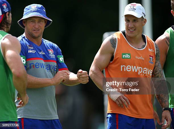 Newcastle Knights coach Nathan Brown with player Trent Hodkinson during a Newcastle Knights NRL pre-season training session at Hunter Stadium on...