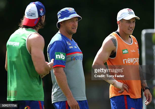 Newcastle Knights coach Nathan Brown with player Trent Hodkinson during a Newcastle Knights NRL pre-season training session at Hunter Stadium on...