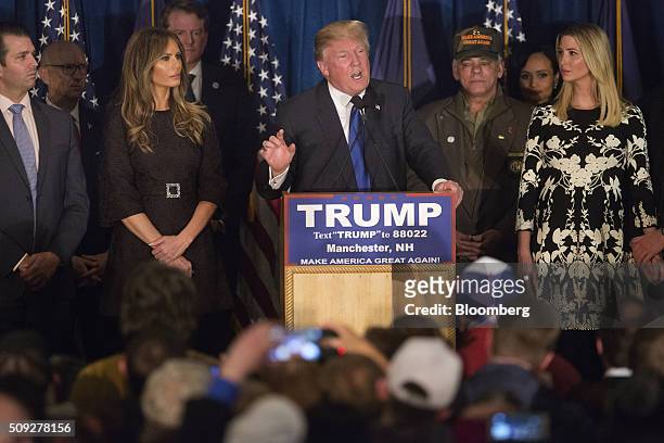 Donald Trump, president and chief executive of Trump Organization Inc. And 2016 Republican presidential candidate, center, speaks as son Donald Trump...